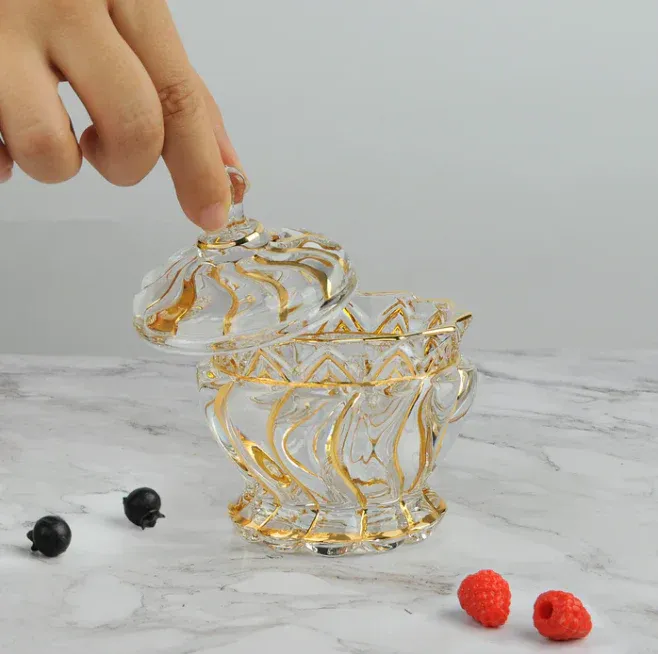 Swirl design candy bowl with lid gold