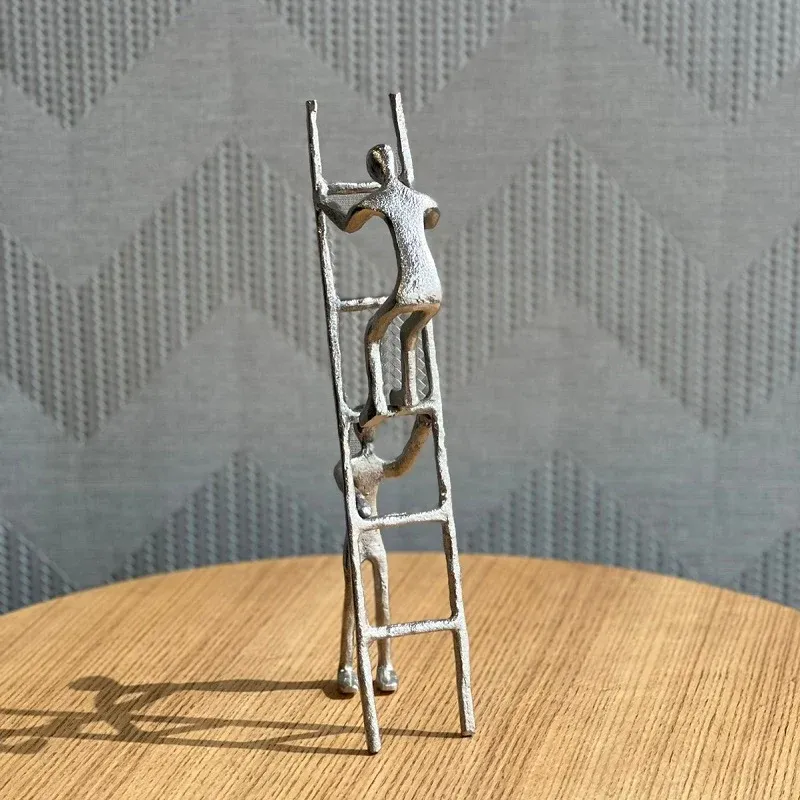 SILVER MAN WITH LADDER